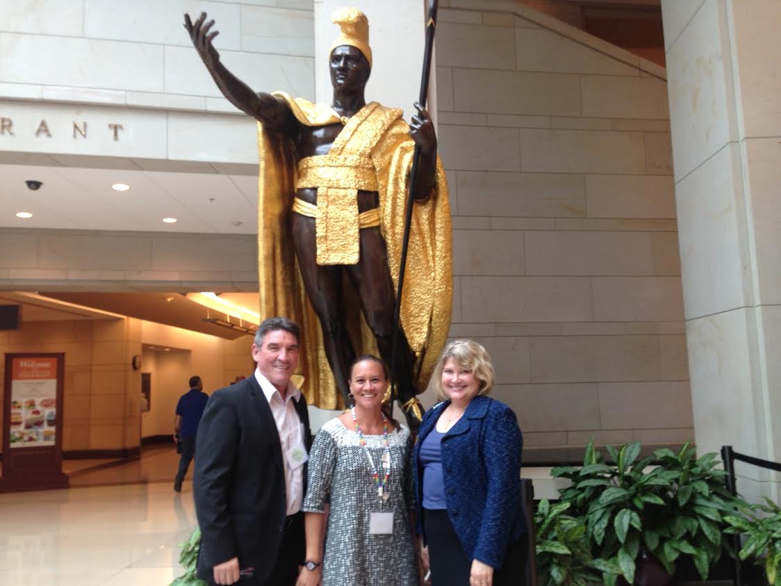 Our Hawaiian colleagues pose with statue of King Kamehameha I at the US Capitol building during the 2015 Washington Symposium.